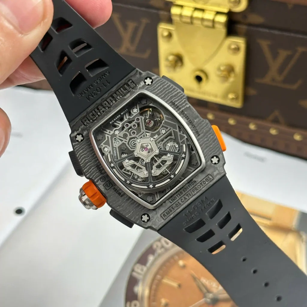Super Clone Richard Mille RM 65-01 Richard Mille McLaren W1 Split-Seconds Chronograph McLaren W1 — on leather display
