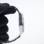 Super Clone Rolex GMT-Master II 126710BLNR “Batman” — on leather display