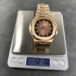 Super Clone Patek Philippe Nautilus 5711/1R-001 40mm Chocolate Dial Rose Gold V3 Update — on leather display