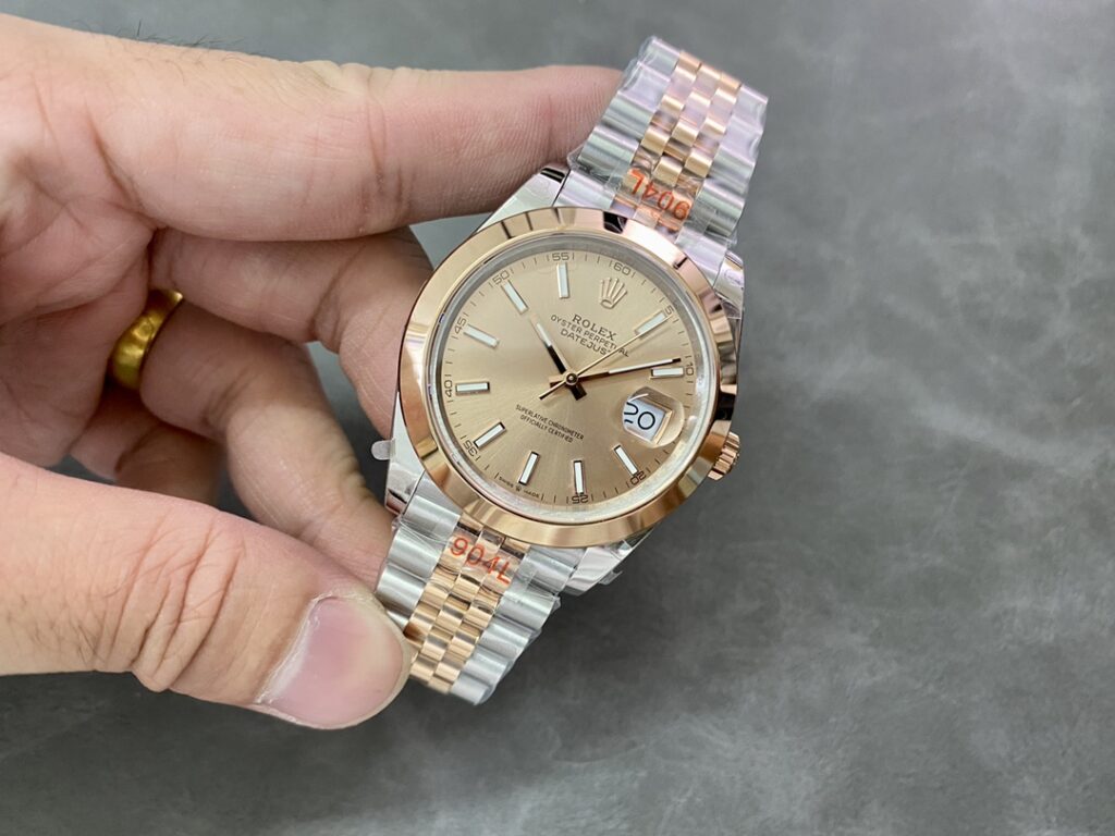 Super Clone Rolex Datejust Champagne Dial 126303-0010 41 mm — on leather display