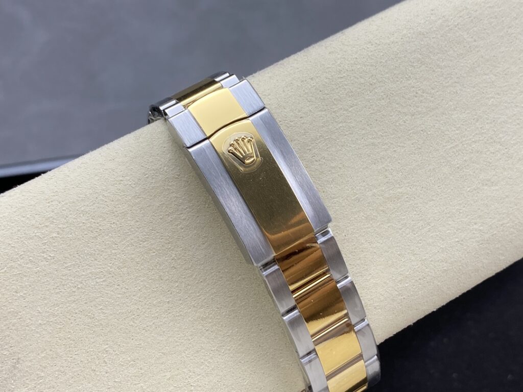 Super Clone Rolex Datejust Champagne Diamond Dial 126333-0011 41 mm — on leather display