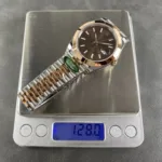 Super Clone Rolex Datejust Chocolate Dial 126201 Jubilee 36 mm — on leather display