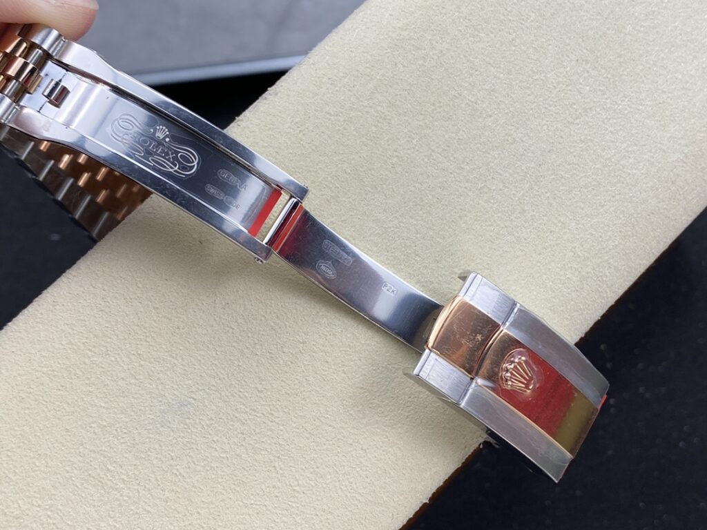 Super Clone Rolex Datejust Rosé Dial 126231-0027 36 mm — on leather display